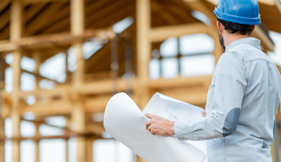 Contractor inspects new build home.